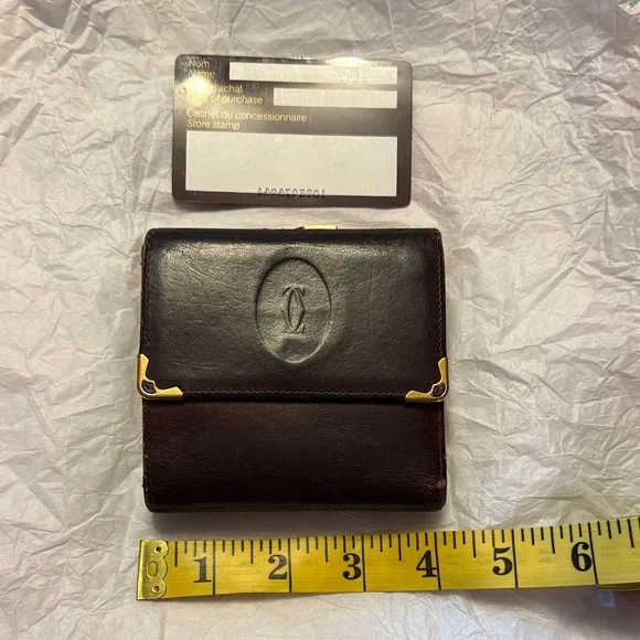 Pre-Loved Cartier Les Must Line burgundy Leather Wallet with KISS Lock Coin - Picture 15 of 16